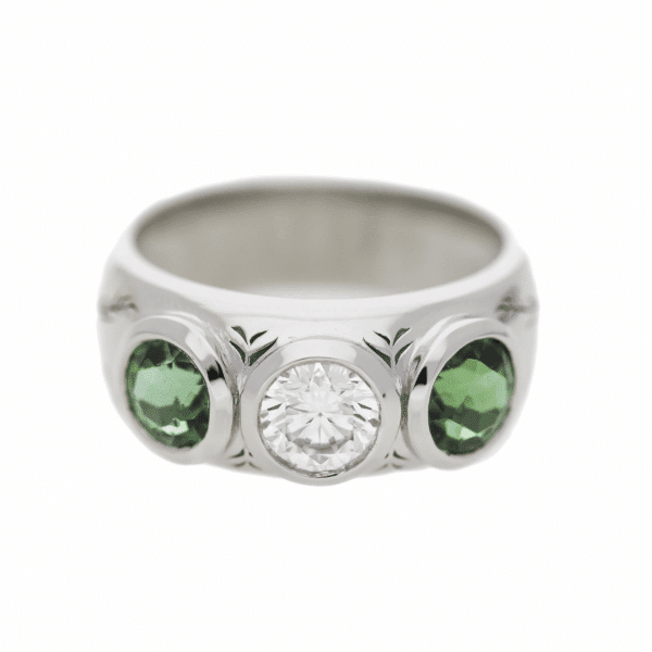 White Gold Ring With Diamonds And Emeralds