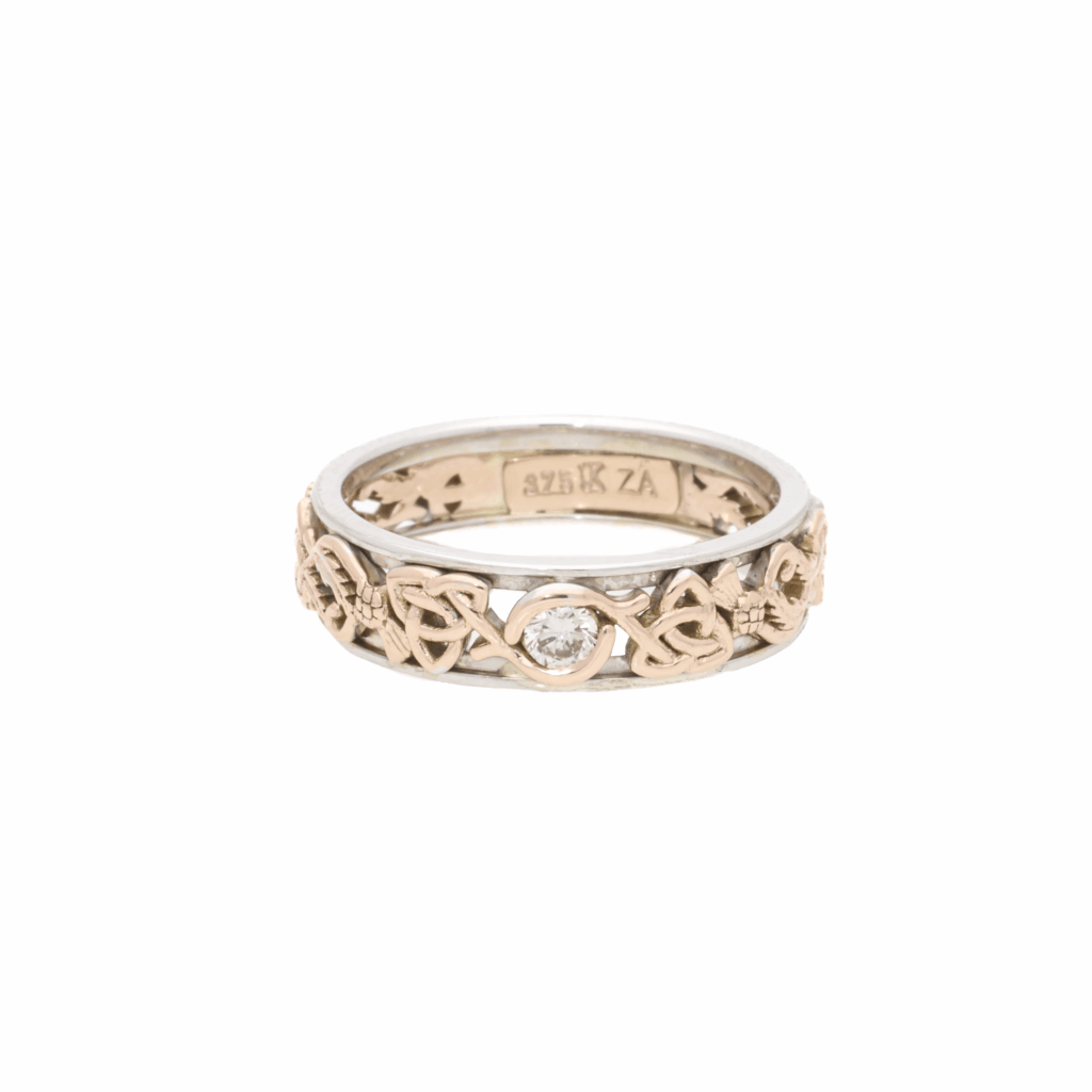 Keltischer Ring aus Weiß- und Roségold mit Diamant